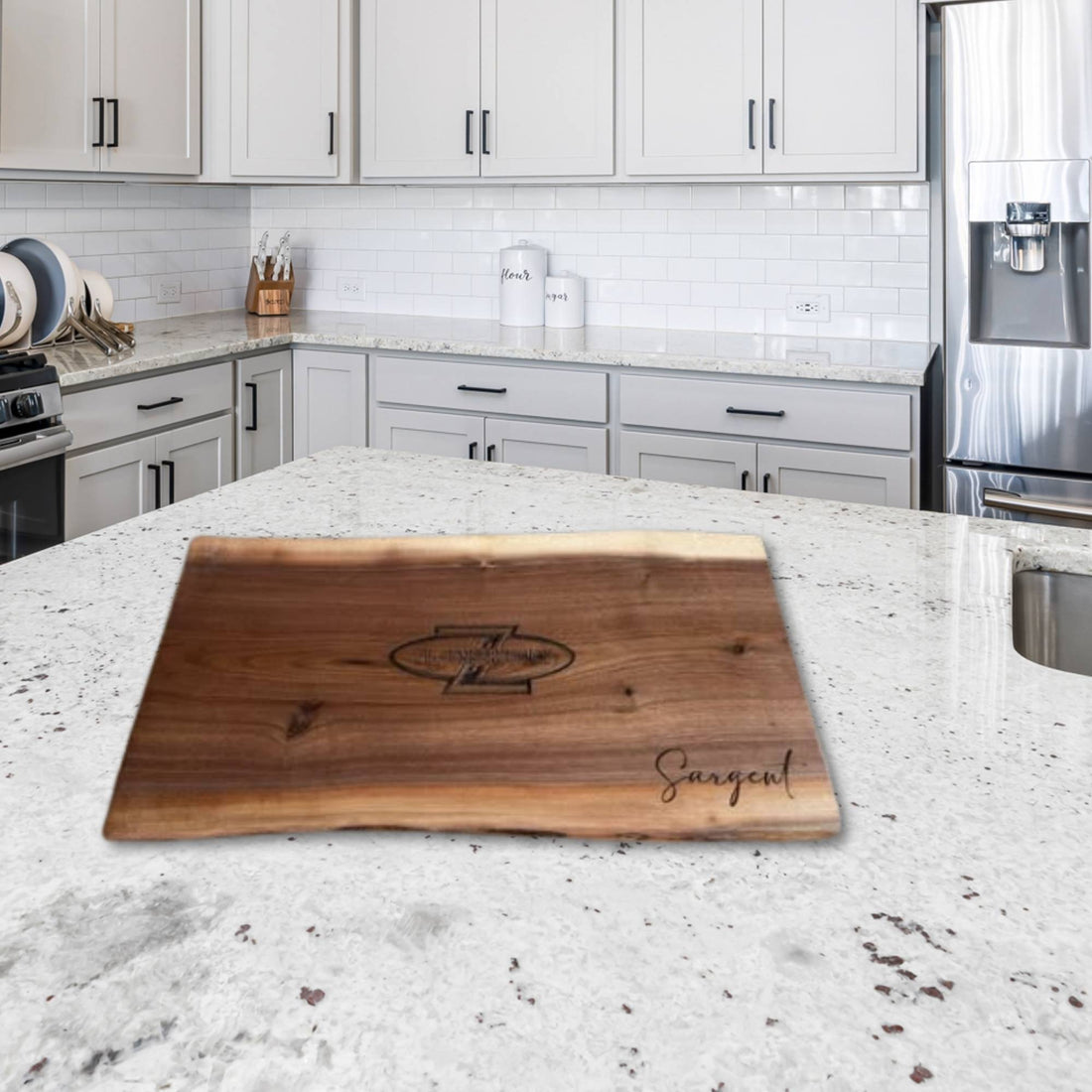 corporate branded live edge walnut serving board on kitchen island