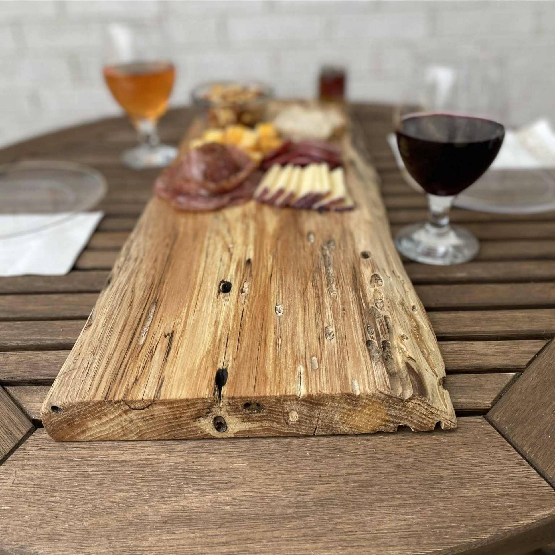 ash live edge serving board used for charcuterie and serving