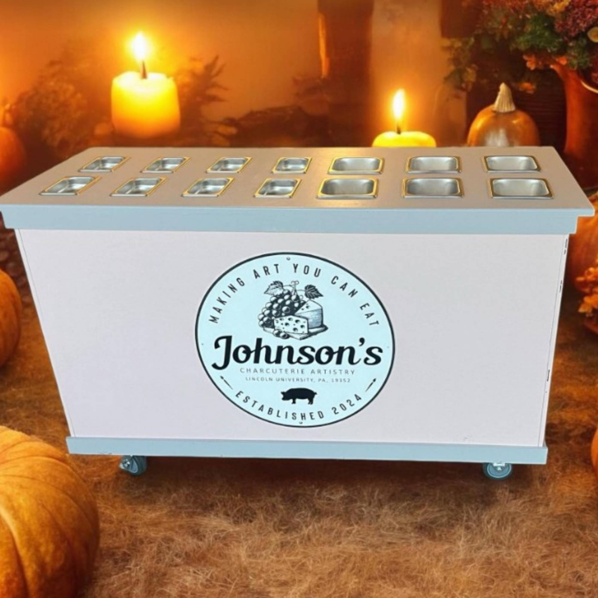 round acrylic layered logo sign mounted on a charcuterie cart