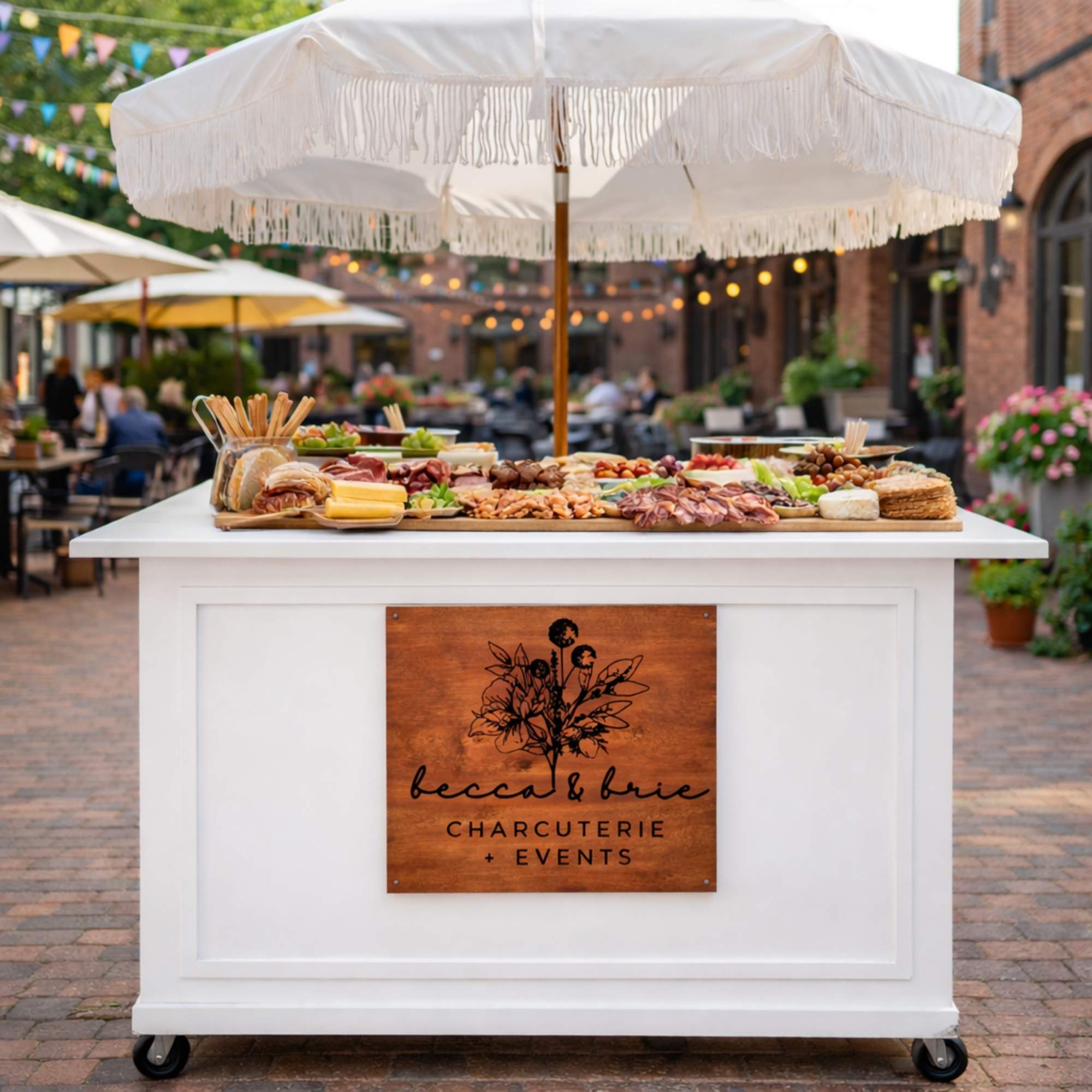 custom charcuterie cart sign at outdoor venue