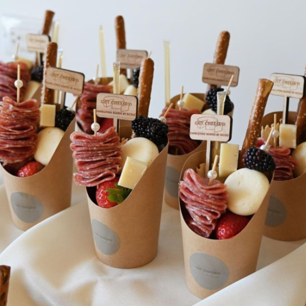 custom engraved logo wood food picks in charcuterie cups