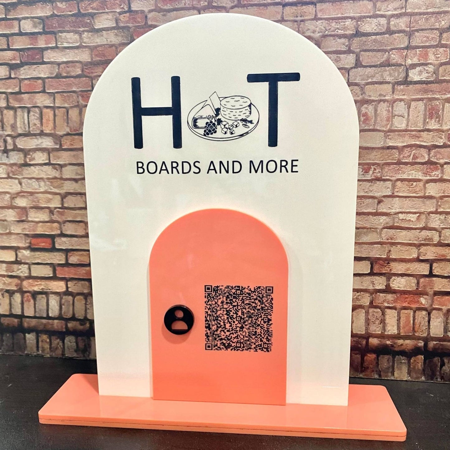 Two piece acrylic layered business name sign with QR code and logo