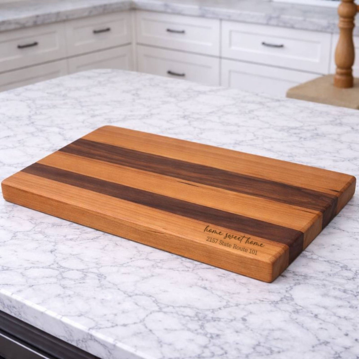 customized cherry and walnut cutting board on kitchen island