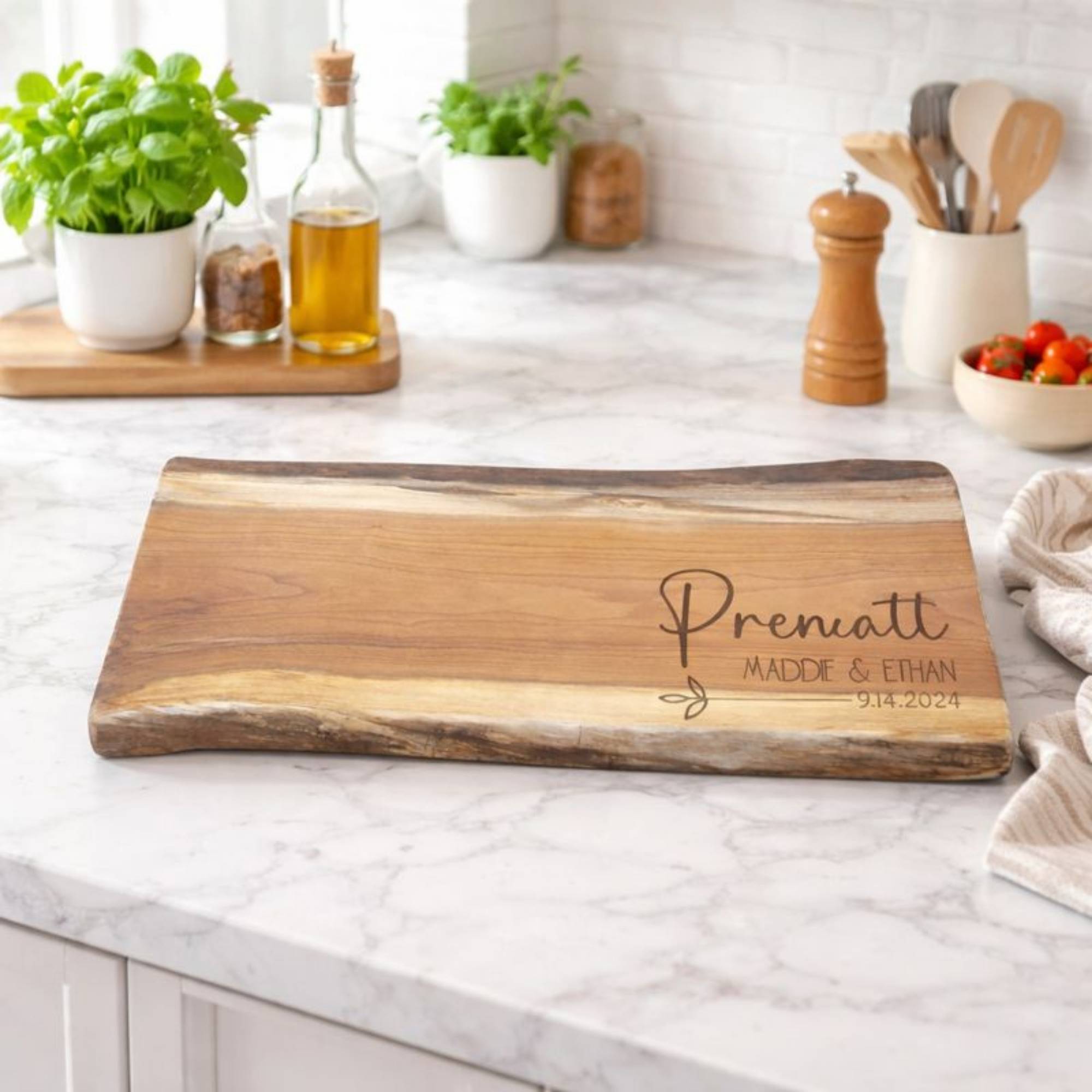 live edge cherry board showing a name engraved on the board