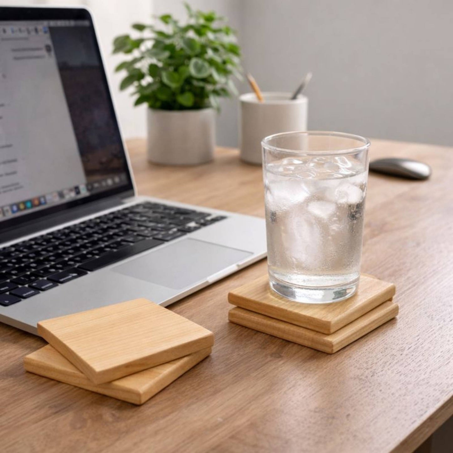 hardwood cherry coaster on desk with laptop