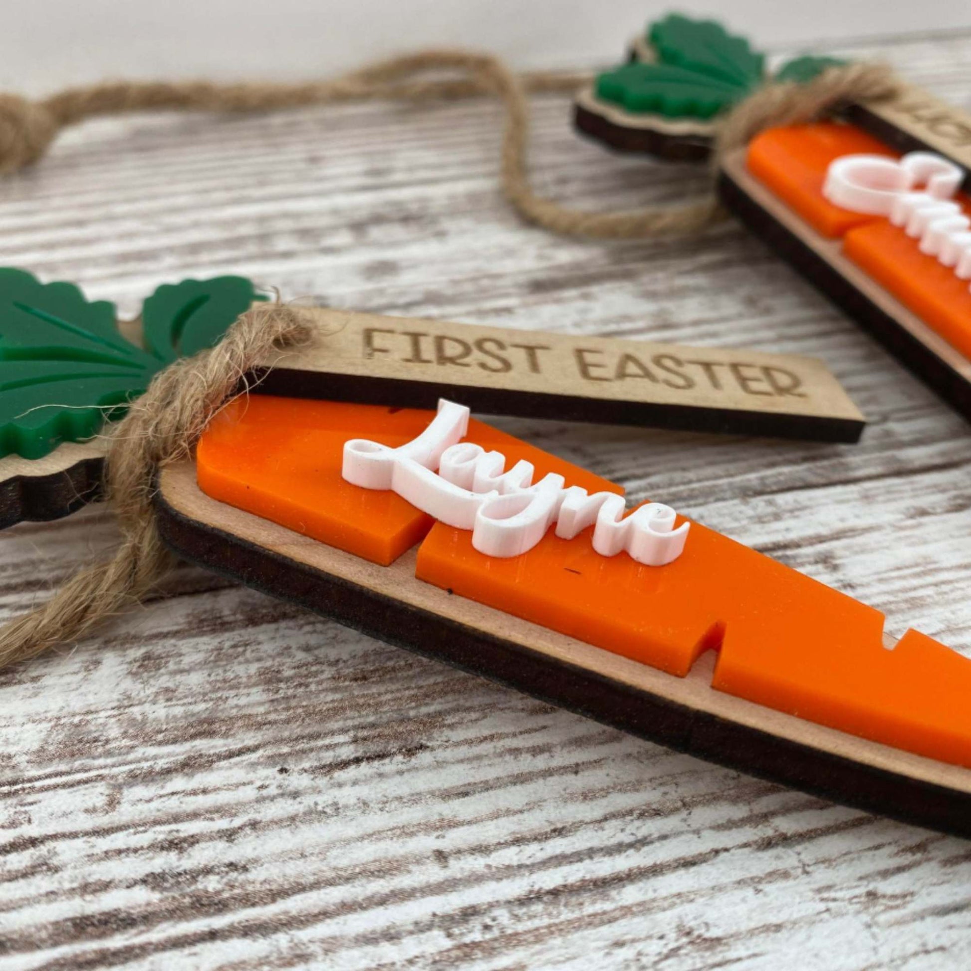 Up close image of the layered personalized carrot easter basket name tag