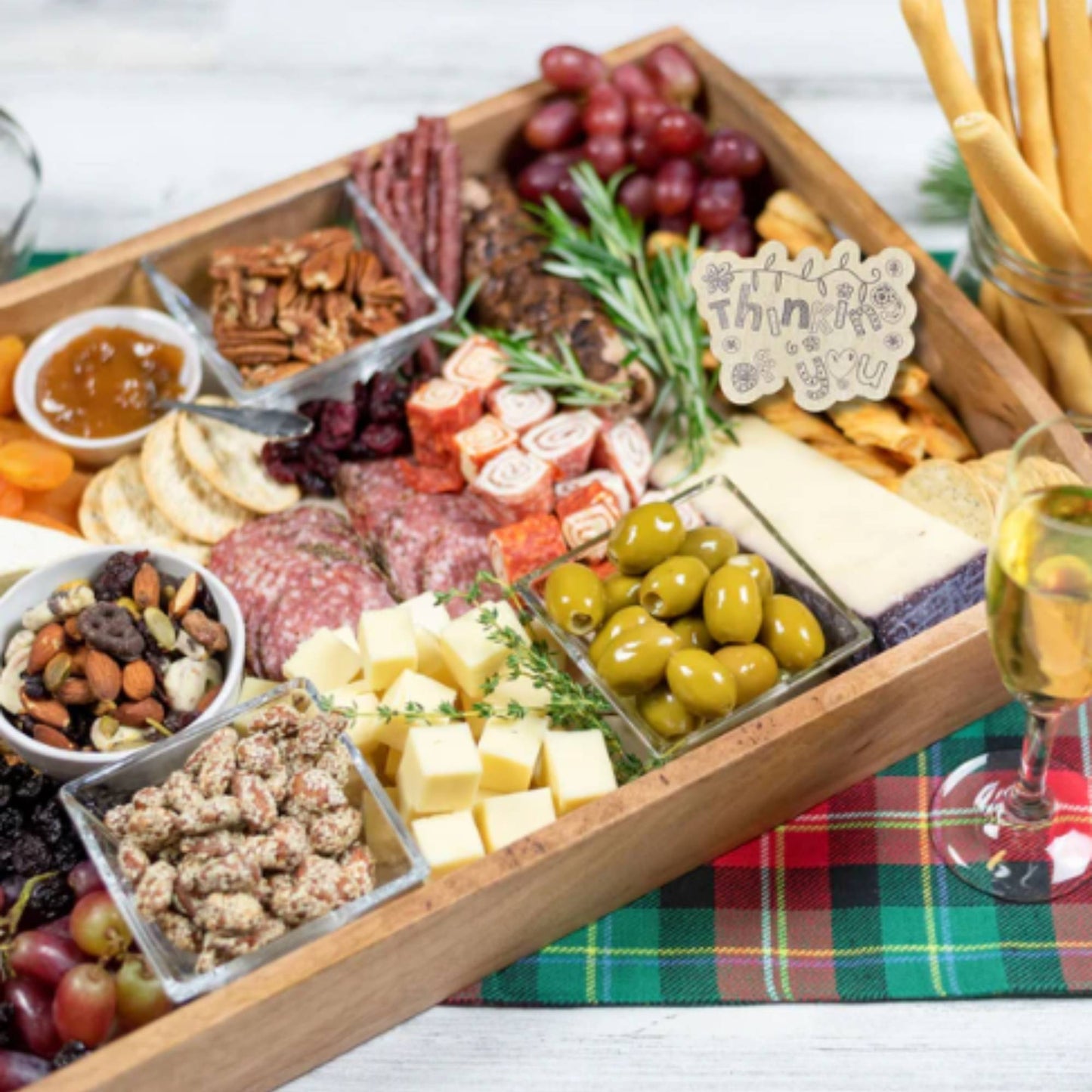 thinking of you special occasion wood tag on a charcuterie display