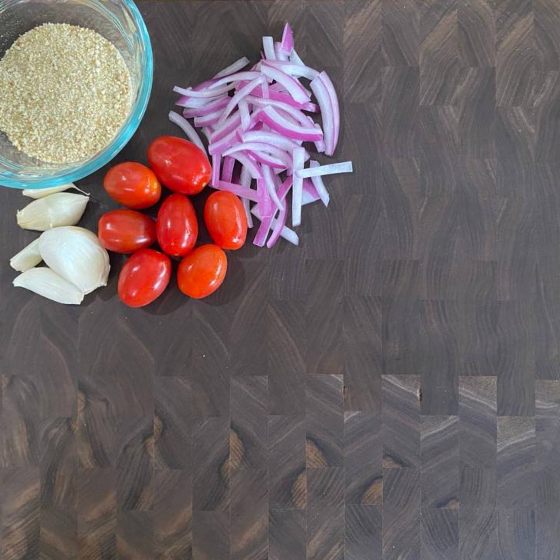 close up view of walnut end grain cutting board showing grain pattern